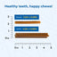 Comparison of Regular and Jumbo sizes of a chew product with a ruler for scale on a blue background.